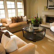 Custom living room with custom fireplace mantle | Avon, OH | North Star Premier Custom Homes