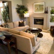 Custom living room with tile floor, custom built ins & fire place | Avon, OH | North Star Premier Custom Homes