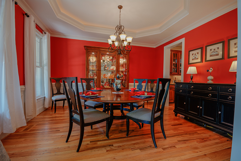 Dining room with custom paneling & ceiling inset | Avon, OH | North Star Premier Custom Homes