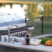 Custom outdoor kitchen with stone patio | Avon, OH | North Star Premier Custom Homes